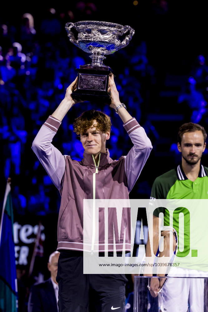 MELBOURNE, VIC - JANUARY 28: Jannik Sinner of Italy raised his trophy above his head after winning the finals of the 2024 Australian Open on January 28 2024, at Melbourne Park in Melbourne, Australia. (Photo by Jason Heidrich Icon Sportswire) TENNIS: JAN 28 Australian Open Icon240128013
