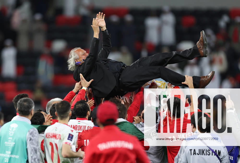 KW04 (240129) -- DOHA, Jan. 29, 2024 -- Petar Segrt (top), head coach of Tajikistan, is thrown in the air by his players after winning the round of 16 match between Tajikistan and the United Arab Emirates at AFC Asian Cup Qatar 2023 in Doha, Qatar, Jan. 28, 2024. ) (SP)QATAR-DOHA-FOOTBALL-AFC ASIAN CUP-TAJIKISTAN VS UAE JiaxHaocheng