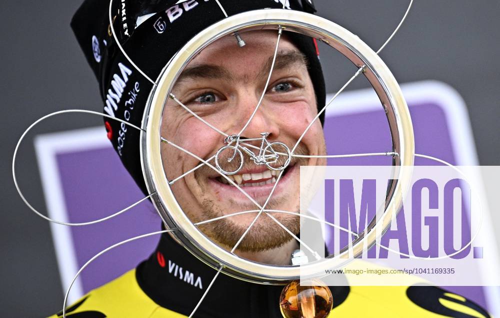 KW08 Slovenian Jan Tratnik of Team Visma-Lease a Bike celebrates on the podium after winning the 79th edition of the men s one-day cycling race Omloop Het Nieuwsblad (UCI World Tour), 202km from Gent to Ninove, Saturday 24 February 2024. JASPERxJACOBS x86855257x