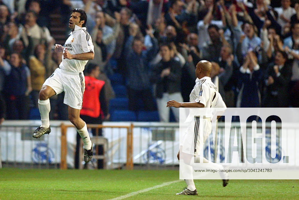 Onderwerp Subject: Real Madrid (3-1) Champions League Reklame: Club Team Country: Real Madrid Seizoen Season: 2002 2003 FOTO PHOTO: Real Madrid s ROBERTO CARLOS (R) and LUIS FIGO celebrating after goal MADRID ESP Content not available for redistribution in The Netherlands directly or indirectly through any third parties.