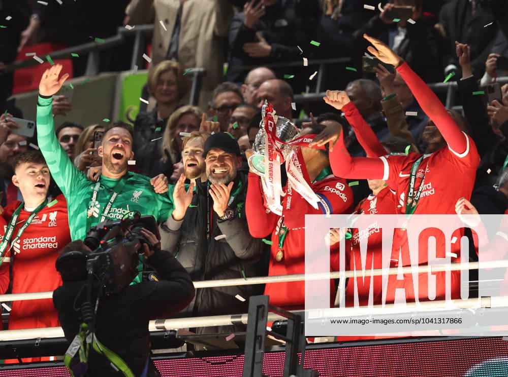 London, England, 25th February 2024. Jurgen Klopp, Manager of Liverpool and Virgil van Dijk of Liverpool lift the trophy after the Carabao Cup match at Wembley Stadium, London. Picture credit should read: Paul Terry Sportimage . SPI-2963-0113