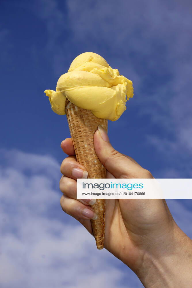 ice cream cone with mango ice cream from an Allgäu ice cream parlour 06 09 2020, ice cream cone 06 09 2020, ice cream cone