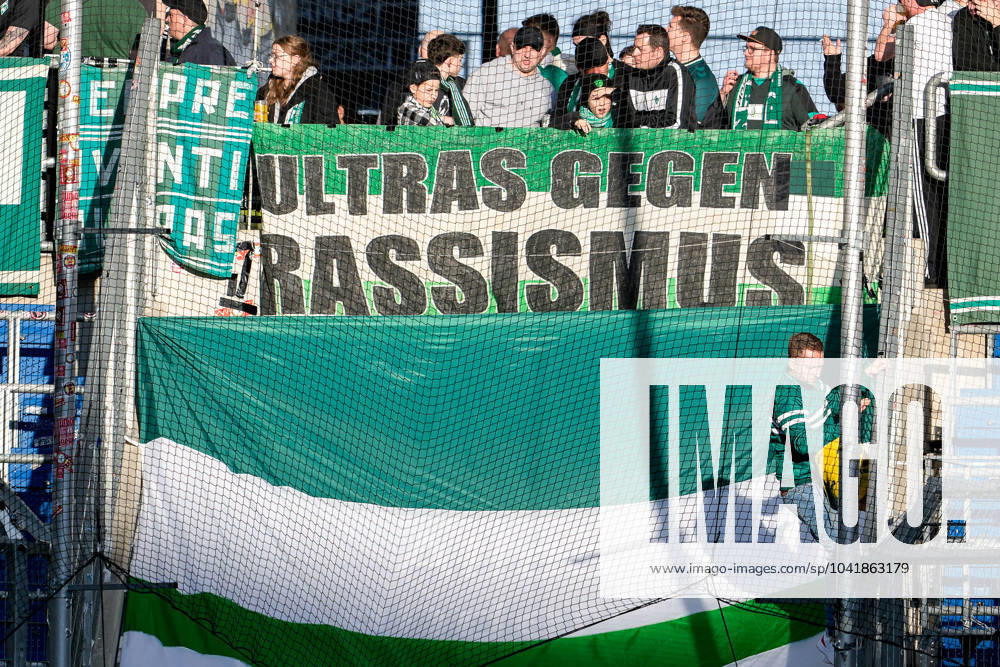 The fans of SV Werder Bremen show a banner in the fan curve, banner with the inscription Ultras against racism, fans, Ultras audience, spectators, mood, atmosphere, stadium, 03 03 2024, Sinsheim Germany , Football, Bundesliga, TSG 1899 Hoffenheim SV Werder Bremen, DFB DFL REGULATIONS PROHIBIT ANY USE OF PHOTOGRAPHS AS IMAGE SEQUENCES AND OR QUASI VIDEO
