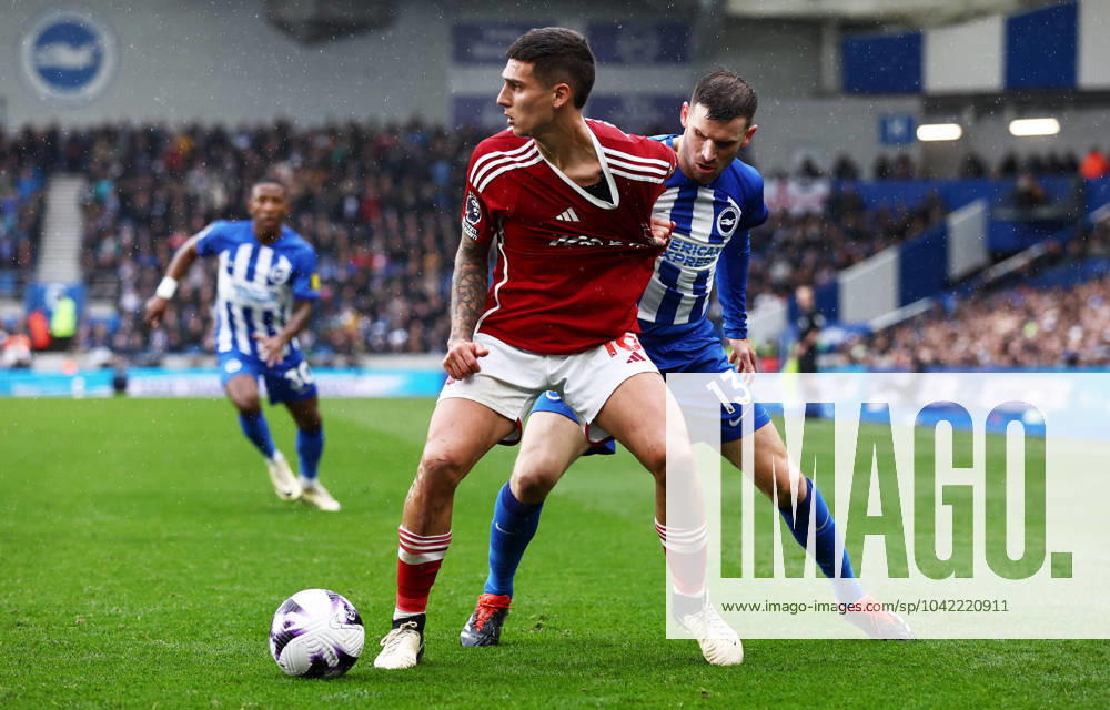 Nicolas Dominguez of Nottingham Forest and Pascal Gross of Brighton & Hove Albion. Brighton & Hove Albion v Nottinham Forest, Premier League, Football, American Express Community Stadium, Brighton, UK - 10 Mar 2024
