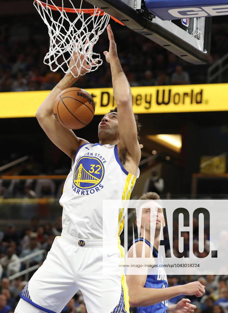 Orlando, FL - Florida, USA: The Golden State Warriors Trayce Jackson-Davis (23) dunks over the Orlando Magic s Franz Wagner at the Kia Center on Wednesday, March 27, 2024, in Orlando, Florida. Orlando USA - ZUMAm67_ 0442592972st