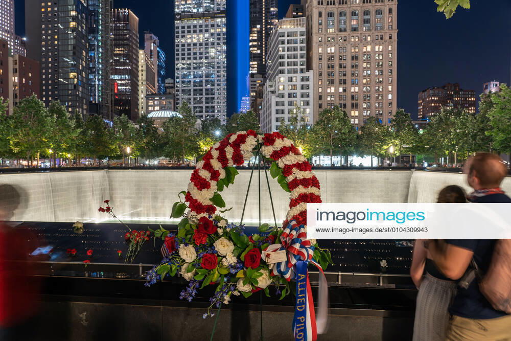 A memorial wreaths from Allied Pilots Association is seen at the National September 11 Memorial and Museum on 19th anniversary of terror attack..The twin lights represent the Twin Towers which were destroyed during terror attack in 2001. New York United States - ZUMAs197 20200911_zaa_s197_225