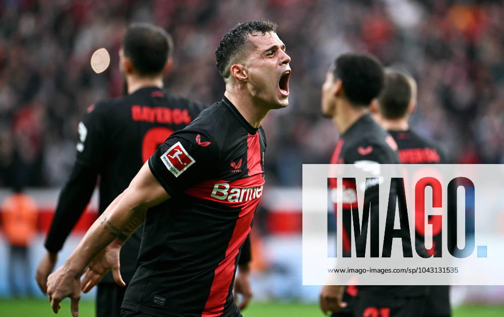 Soccer, Bundesliga, Germany, Men, Season 2023 2024, Matchday 27, BayArena Leverkusen, Bayer Leverkusen TSG Hoffenheim 2 1 Cheers Granit Xhaka LEV after the goal to 2 1 by Patrik Schick LEV Cheers, joy, action DFB DFL REGULATIONS PROHIBIT ANY USE OF PHOTOGRAPHS AS IMAGE SEQUENCES AND OR QUASI VIDEO