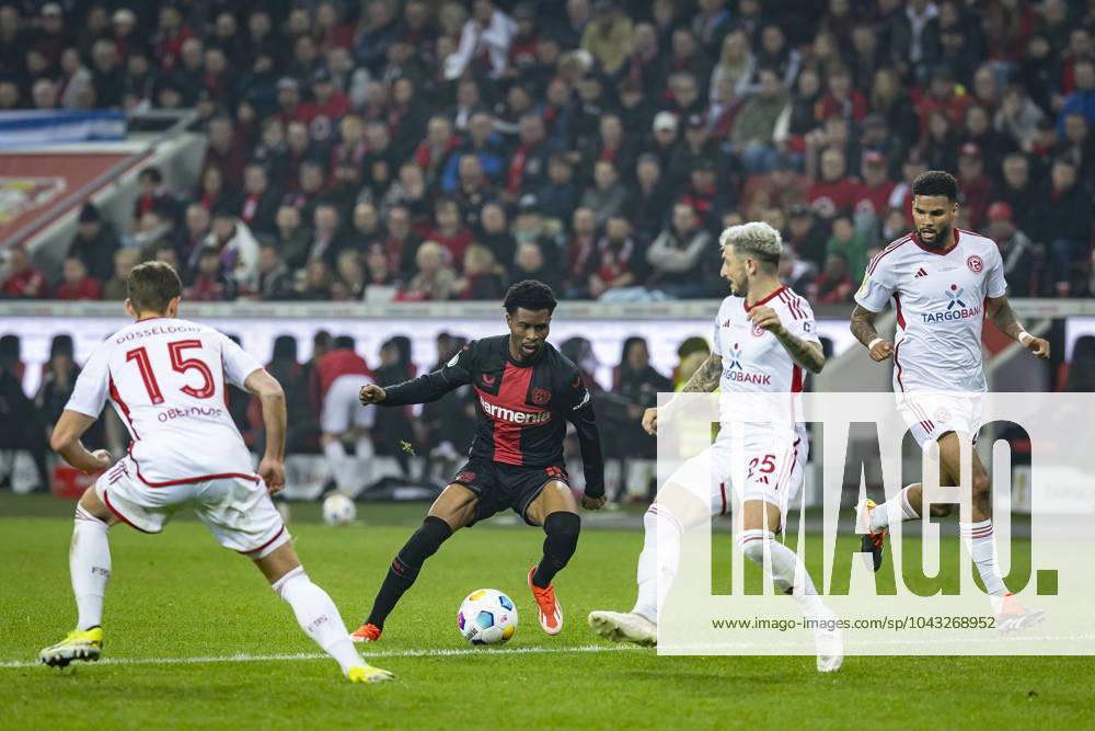 DFB Pokal, Bayer 04 Leverkusen Fortuna Düsseldorf, 03 04 2024 Nathan Tella Bayer 04 Leverkusen, 19 , left dus15 , Bayer 04 Leverkusen Fortuna Düsseldorf in the DFB Pokal semi-final on 03 04 2024 at the BayArena in Leverkusen DFL REGULATIONS PROHIBIT ANY USE OF PHOTOGRAPHS AS IMAGE SEQUENCES AND OR QUASI VIDEO