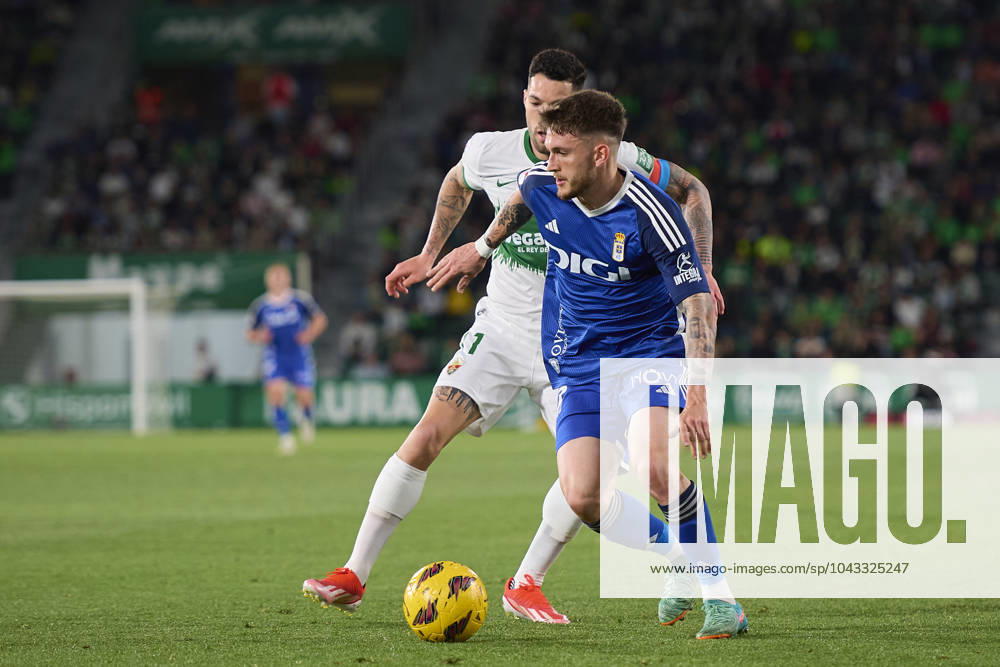 LaLiga Hypermotion, Elche CF v Real Oviedo ELCHE, SPAIN - APRIL 5: Viti Rozada Right Winger of Real Oviedo competes for the ball with Tete Morente Left Winger of Elche CF during the LaLiga Hypermotion match between Elche CF and Real Oviedo at Manuel Martinez Valero Stadium, on April 5, 2024 in Elche, Spain. (Photo By Francisco Macia Photo Players Images) Elche Estadio Manuel Martinez Valero Alicante Spain