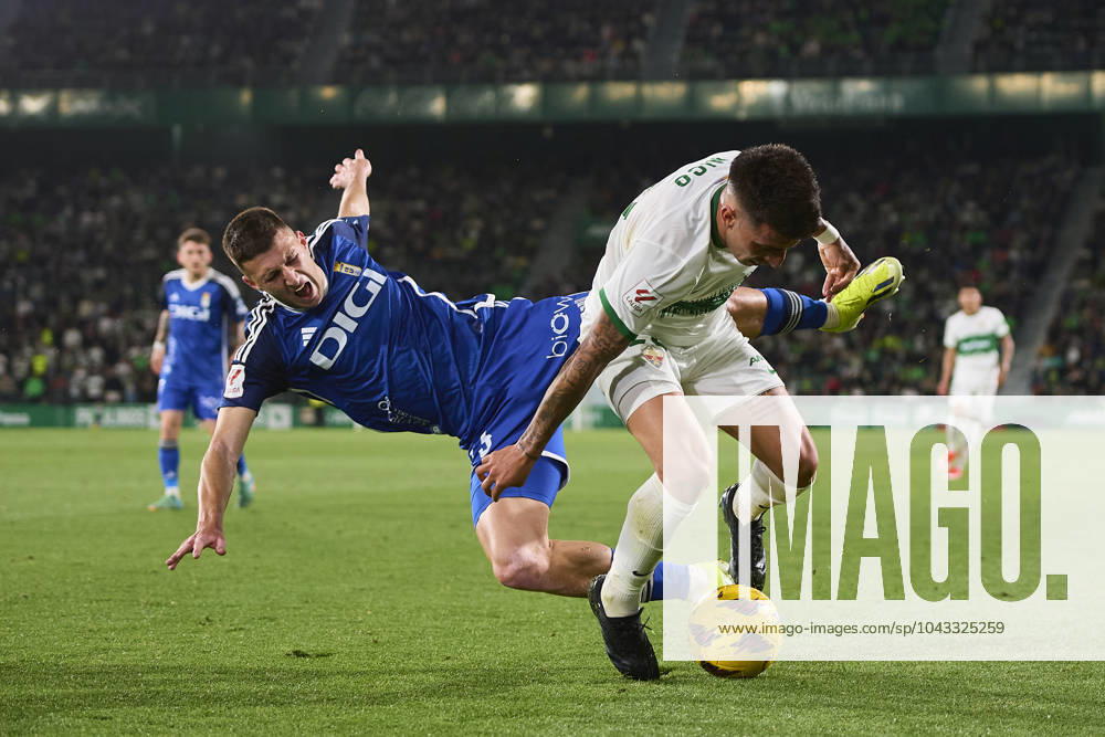 LaLiga Hypermotion, Elche CF v Real Oviedo ELCHE, SPAIN - APRIL 5: Francisco Mascarenha Centre-Forward of Real Oviedo competes for the ball with Nico Fernandez Left-Back of Elche CF during the LaLiga Hypermotion match between Elche CF and Real Oviedo at Manuel Martinez Valero Stadium, on April 5, 2024 in Elche, Spain. (Photo By Francisco Macia Photo Players Images) Elche Estadio Manuel Martinez Valero Alicante Spain