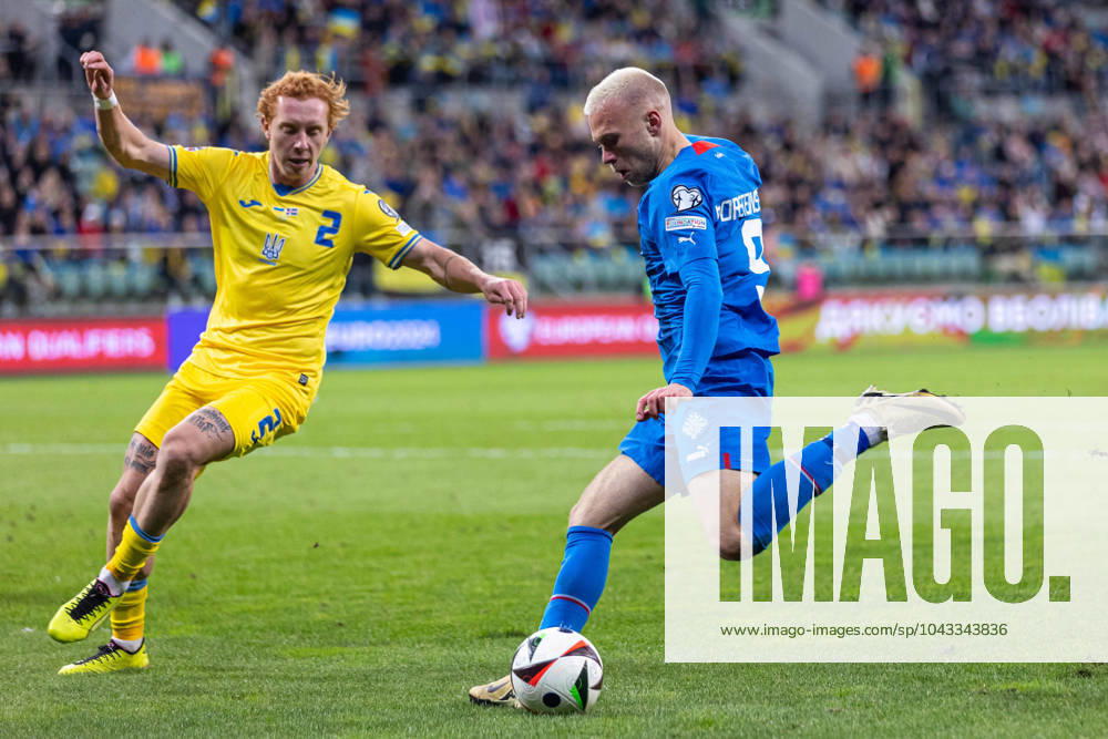 WROCLAW 26.03.2024 FINALOWY MECZ BARAZOWY ELIMINACJE DO MISTRZOSTW EUROPY 2024: UKRAINA - ISLANDIA --- UEFA EURO, EM, Europameisterschaft,Fussball 2024 QUALIFICATION FINAL PLAY-OFF MATCH IN WROCLAW: UKRAINE - ISLAND nz JON DAGUR THORSTEINSSON YUKHYM KONOPLIA FOT. ERNEST KOLODZIEJ 400mm.pl NEWSPIX.PL --- Newspix.pl 20240326_KOL1625