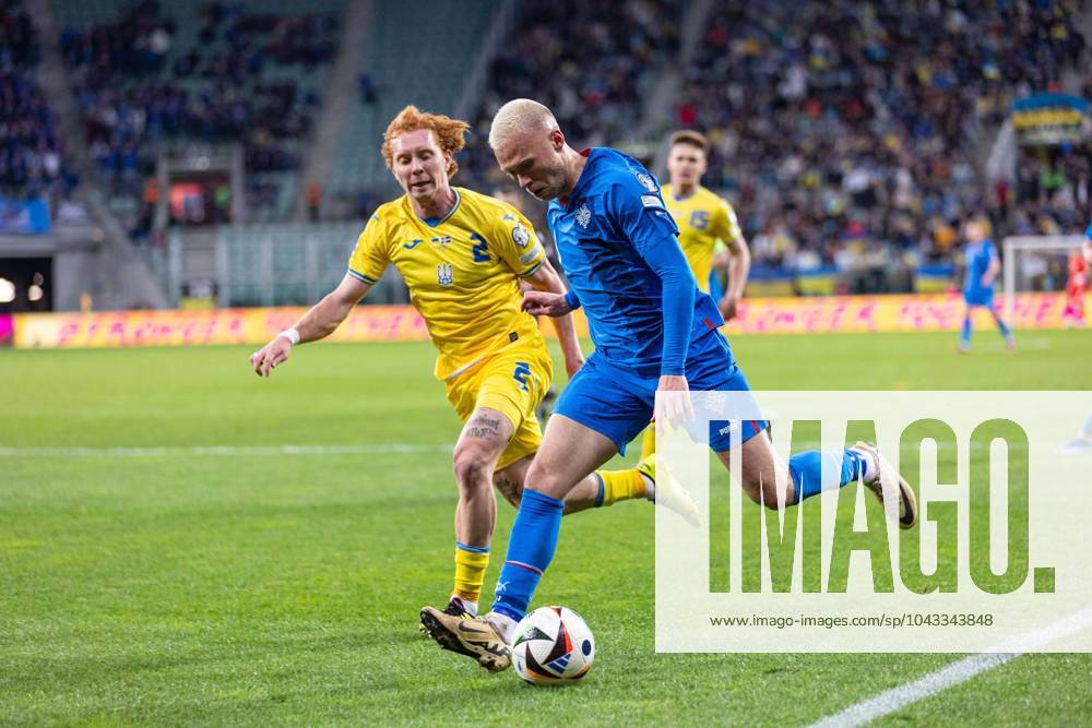 WROCLAW 26.03.2024 FINALOWY MECZ BARAZOWY ELIMINACJE DO MISTRZOSTW EUROPY 2024: UKRAINA - ISLANDIA --- UEFA EURO, EM, Europameisterschaft,Fussball 2024 QUALIFICATION FINAL PLAY-OFF MATCH IN WROCLAW: UKRAINE - ISLAND nz YUKHYM KONOPLIA JON DAGUR THORSTEINSSON FOT. ERNEST KOLODZIEJ 400mm.pl NEWSPIX.PL --- Newspix.pl 20240326_KOL1756