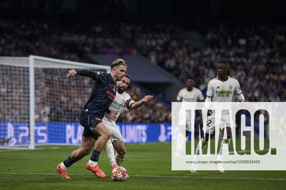 2024-04-09 Real Madrid CF v Manchester City - Quarter-final First Leg - UEFA Champions League 2023 24 MADRID, SPAIN - APRIL 9: Dani Caravajal of Real Madrid CF competes for the ball with Jack Grealish of Manchester City during the Quarter-final First Leg - UEFA Champions League match between Real Madrid CF and Manchester City at Estadio Santiago Bernabeu on April 9, 2024 in Madrid, Spain. (Photo by Pablo Morano BSR Agency) Madrid Spain Content not available for redistribution in The Netherlands directly or indirectly through any third parties.