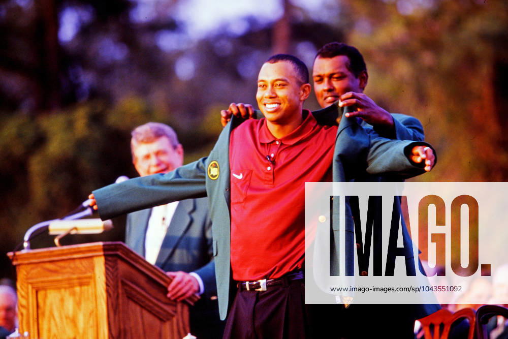 The Masters Golf Tournament at Augusta National Golf Club Vijay Singh helps Tiger Woods into the Green Jacket The Masters Golf Tournament Vijay Singh helps Tiger Woods into the Green Jacket ARCHIVE PHOTO ATTENTION RECORD DATE ESTIMATED Augusta Georgia UnitedmStates The Masters at Augusta National Golf Club