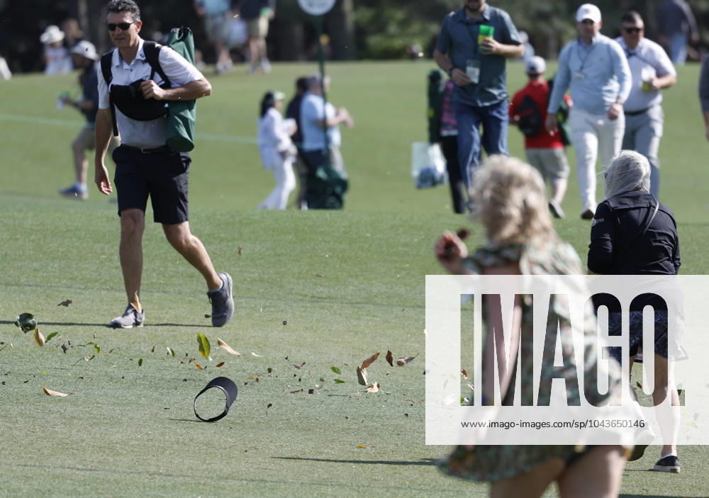 Strong winds blow debris across the course during the second round of the Masters Tournament at Augusta National Golf Club in Augusta, Georgia on Friday, April 12, 2024. AUG20240412148 JOHNxANGELILLO