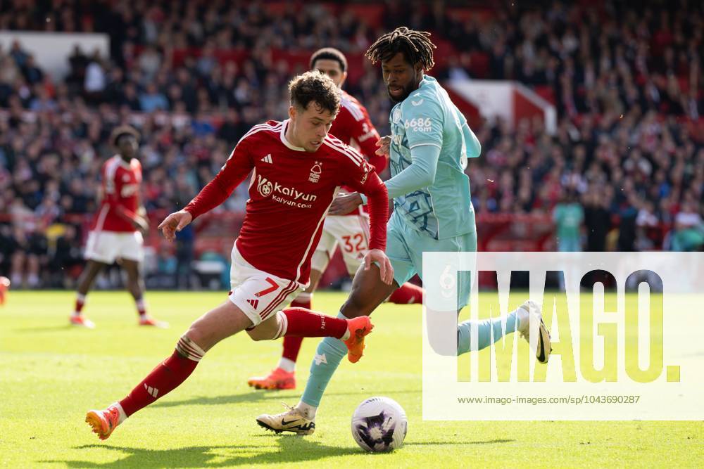 Neco Williams of Nottingham Forest under pressure from Boubacar Traorà of Wolverhampton Wanderers Nottingham Forest v Wolverhampton Wanderers, Premier League, Football, City Ground, Nottingham, UK - 13 Apr 2024