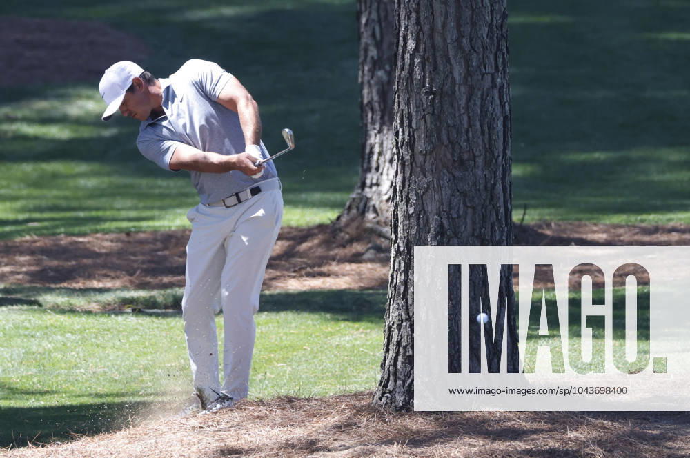 Brooks Koepka hits out of the rough on the seventh hole during the third round of the Masters Tournament at Augusta National Golf Club in Augusta, Georgia on Saturday, April 13, 2024. AUG20240413507 TANNENxMAURY