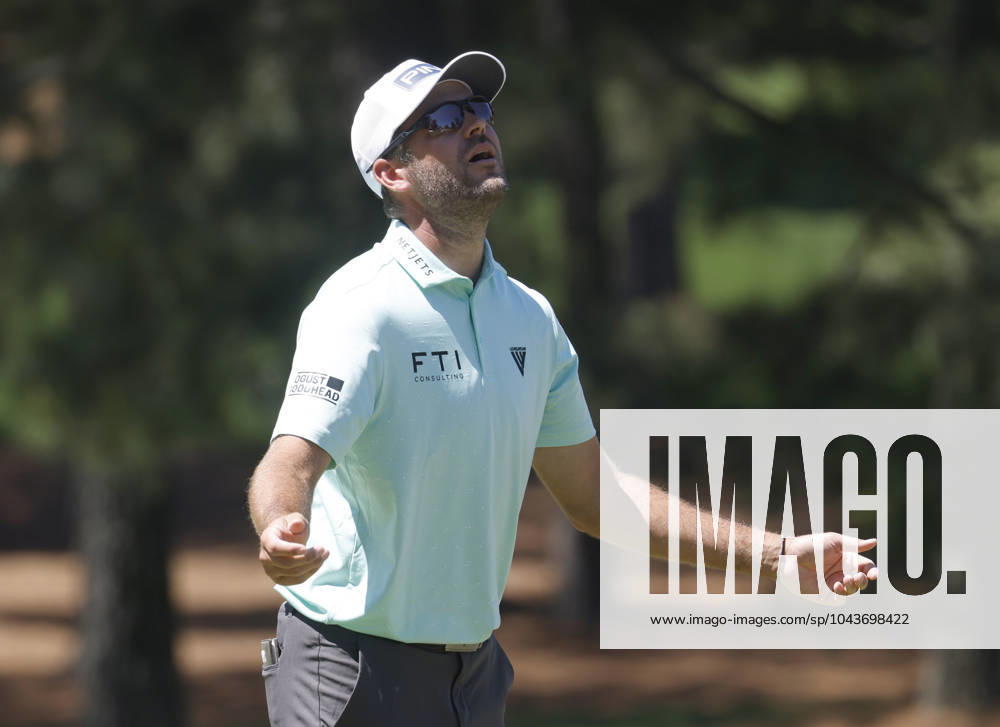 Canada s Corey Conners reacts after missing a putt on the seventh hole during the third round of the Masters Tournament at Augusta National Golf Club in Augusta, Georgia on Saturday, April 13, 2024. AUG20240413506 TANNENxMAURY