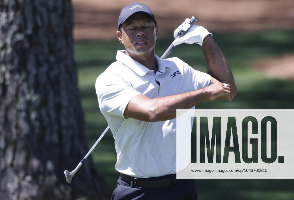 Tiger Woods reacts after chipping to the green on the seventh hole during the third round of the Masters Tournament at Augusta National Golf Club in Augusta, Georgia on Saturday, April 13, 2024. AUG20240413510 TANNENxMAURY