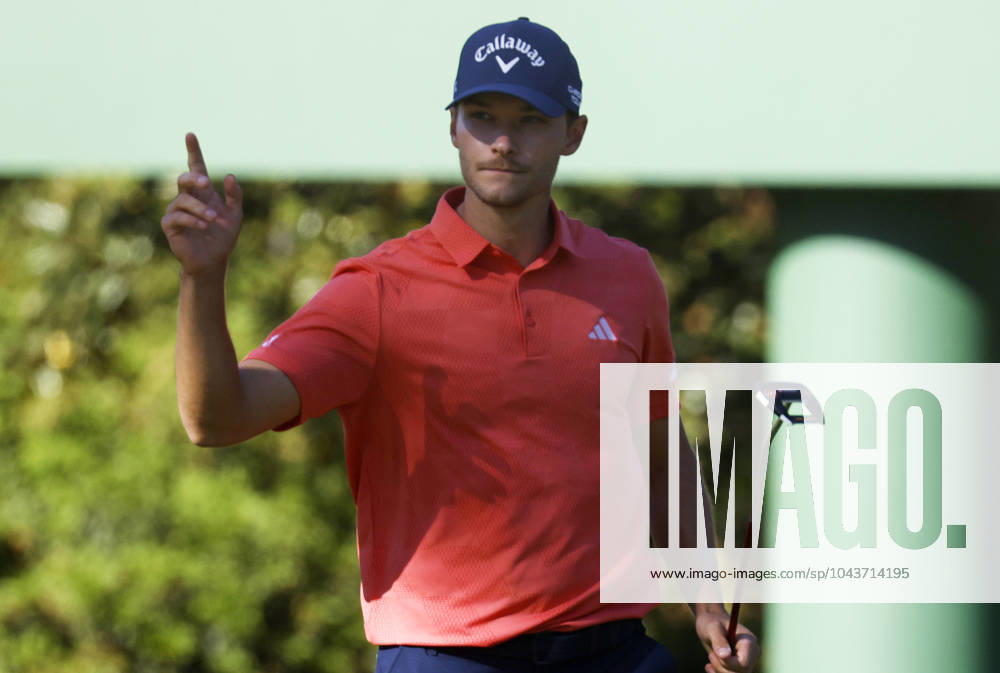 Denmark s Nicolai Hojgaard reacts after a birdie putt on the tenth green during the third round of the Masters Tournament at Augusta National Golf Club in Augusta, Georgia on Saturday, April 13, 2024. AUG20240413545 TANNENxMAURY