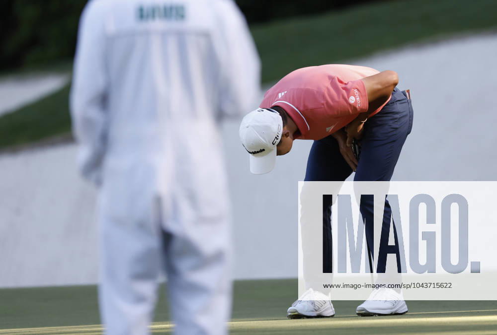 Collin Morikawa reacts after missing a birdie putt on the thirteenth hole during the third round of the Masters Tournament at Augusta National Golf Club in Augusta, Georgia on Saturday, April 13, 2024. AUG20240413117 JOHNxANGELILLO