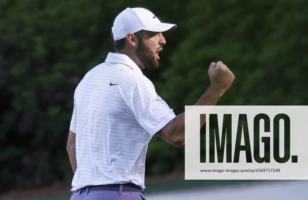 Scottie Scheffler reacts after sinking an eagle putt on the thirteenth hole during the third round of the Masters Tournament at Augusta National Golf Club in Augusta, Georgia on Saturday, April 13, 2024. AUG20240413134 JOHNxANGELILLO