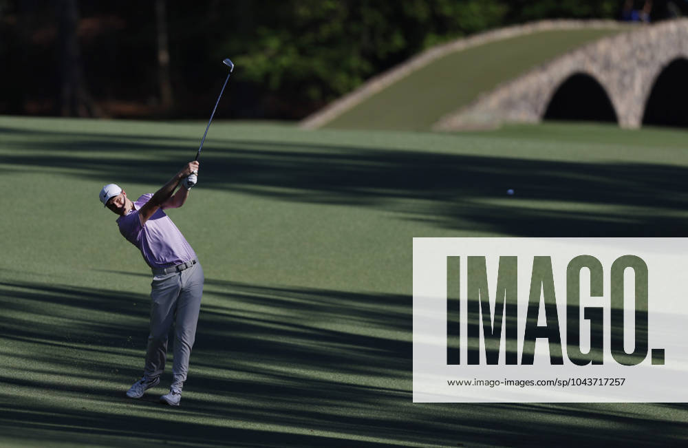 Australia s Cam Davis hits an approach shot on the thirteenth hole during the third round of the Masters Tournament at Augusta National Golf Club in Augusta, Georgia on Saturday, April 13, 2024. AUG20240413132 JOHNxANGELILLO