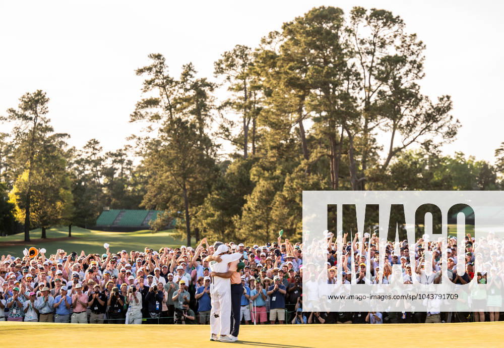 Scottie Scheffler of the United States celebrate with his caddie Ted Scott on the 18th green after winning the final round of the 2024 Masters Golf Tournament on April 14, 2024 in Augusta Photo Petter Arvidson BILDBYRAN kod PA PA0795 bbeng golf masters the masters Augusta us masters jubel