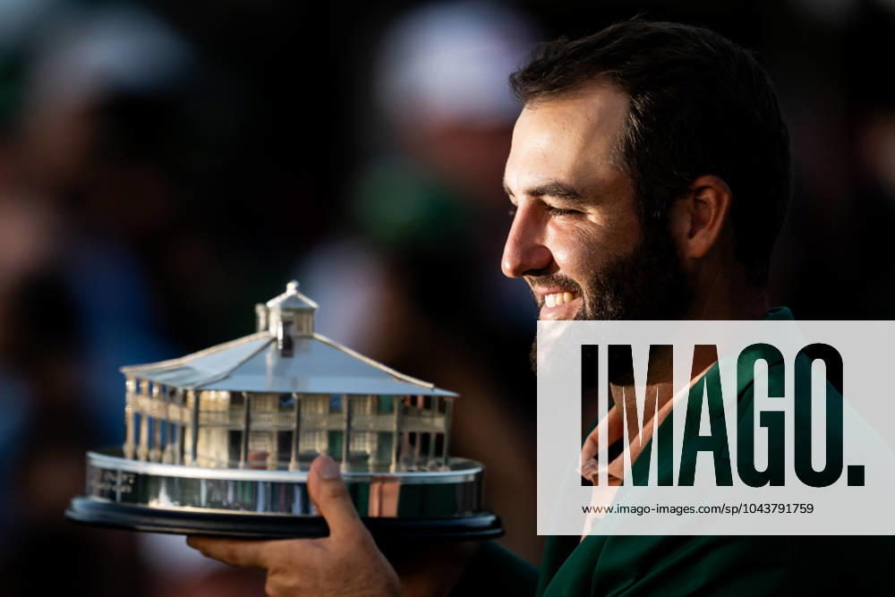 Scottie Scheffler of the United States poses with the trophy and his green jacket after winning the final round of the 2024 Masters Golf Tournament on April 14, 2024 in Augusta Photo Petter Arvidson BILDBYRAN kod PA PA0795 bbeng golf masters the masters Augusta us masters jubel