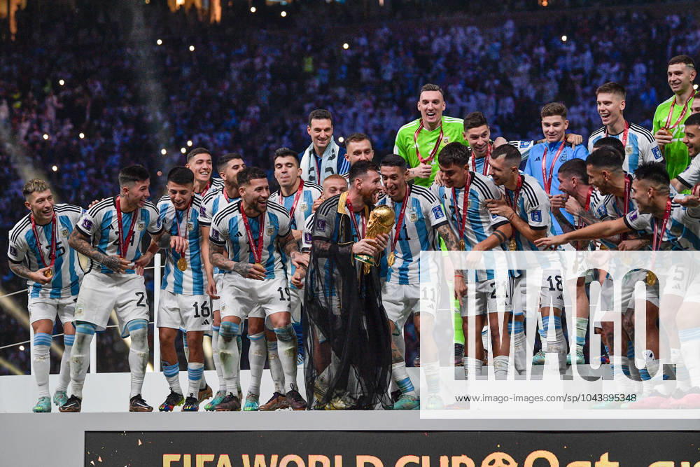 2022-12-19 Argentina v France - Final - FIFA World Cup, WM, Weltmeisterschaft, Fussball Qatar 2022 LUSAIL CITY, QATAR - DECEMBER 18: Coach Lionel Scaloni of Argentina, Franco Armani of Argentina, Juan Foyth of Argentina, Nicolas Tagliafico of Argentina, Gonzalo Montiel of Argentina, Leandro Paredes of Argentina, German Pezzella of Argentina, Rodrigo De Paul of Argentina, Marcos Acuna of Argentina, Julian Alvarez of Argentina, Lionel Messi of Argentina, Angel Di Maria of Argentina, Geronimo Rulli of Argentina, Cristian Romero of Argentina, Exequiel Palacios of Argentina, Angel Correa of Argentina, Thiago Almada of Argentina, Alejandro Gomez of Argentina, Guido Rodriguez of Argentina, Nicolas Otamendi of Argentina, Alexis Mac Allister of Argentina, Paulo Dybala of Argentina, Lautaro Martinez of Argentina, Damian Martinez of Argentina, Enzo Fernandez of Argentina, Lisandro Martinez of Argentina and Nahuel Molina of Argentina celebrating with trophy during the Final - FIFA World Cup Qatar 2022 match between Argentina and France at the Lusail Stadium on December 18, 2022 in Lusail City, Qatar (Photo by Pablo Morano BSR Agency) Lusail City Qatar Content not available for redistribution in The Netherlands directly or indirectly through any third parties.