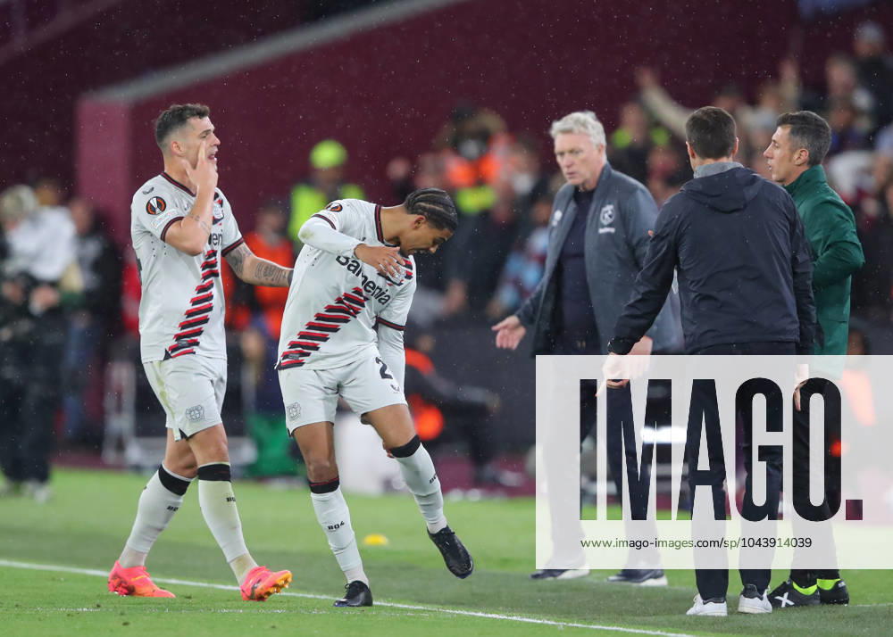 UEFA Europa League Quarter-Final West Ham United v Bayer 04 Leverkusen Amine Adli of Bayer Leverkusen and Granit Xhaka of Bayer Leverkusen appeals to the fourth official, during the UEFA Europa League Quarter-Final match West Ham United vs Bayer 04 Leverkusen at London Stadium, London, United Kingdom, 18th April 2024 (Photo by Gareth Evans News Images) London London Stadium United Kingdom