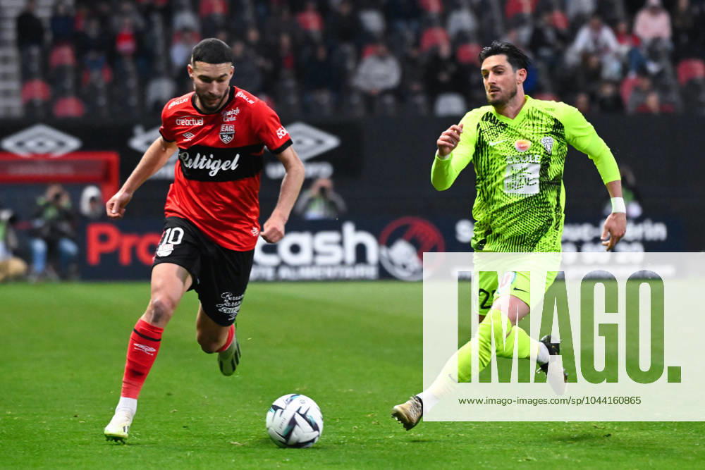 Mehdi MERGHEM ( 10 - Guingamp ) and Florent HANIN ( 26 - Angers ) during the Ligue 2 match between EA Guingamp and Angers SCO at Stade Municipal de Roudourou on April 23, 2024 in Guingamp, France. ( Photo by federico pestellini panoramic ) - FOOTBALL : Guingamp vs Angers - Ligue 2 - 23 04 2024 FedericoPestellini Panoramic