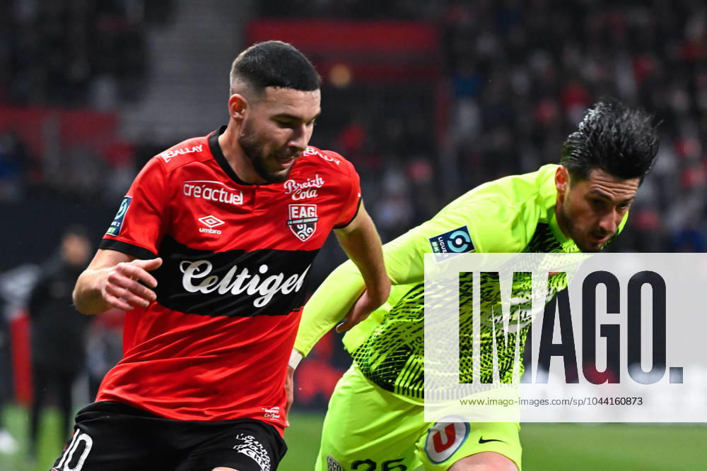 Mehdi MERGHEM ( 10 - Guingamp ) and Florent HANIN ( 26 - Angers ) during the Ligue 2 match between EA Guingamp and Angers SCO at Stade Municipal de Roudourou on April 23, 2024 in Guingamp, France. ( Photo by federico pestellini panoramic ) - FOOTBALL : Guingamp vs Angers - Ligue 2 - 23 04 2024 FedericoPestellini Panoramic