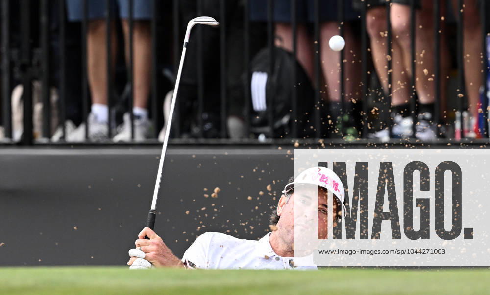 LIV GOLF ADELAIDE, RangeGoats GC captain Bubba Watson plays from the bunker on the 12th during Day 1 of LIV Golf Adelaide at the Grange Golf Club in Adelaide, Friday, April 26, 2024. ( NO ARCHIVING, , NO USE IN BOOKS WITHOUT CONSENT ADELAIDE SOUTH AUSTRALIA AUSTRALIA
