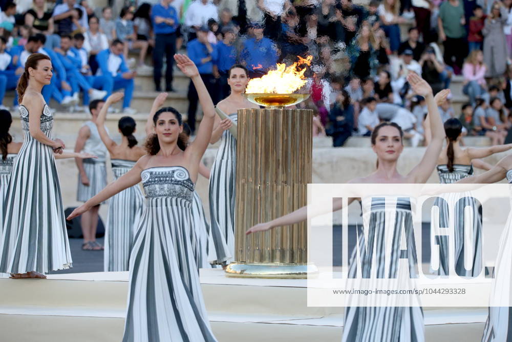 Greek actresses playing the role of priestesses perform during the Olympic Flame handover ceremony, at the Panathenaic Stadium. Athens Greece - ZUMAv62_ 0469213591st