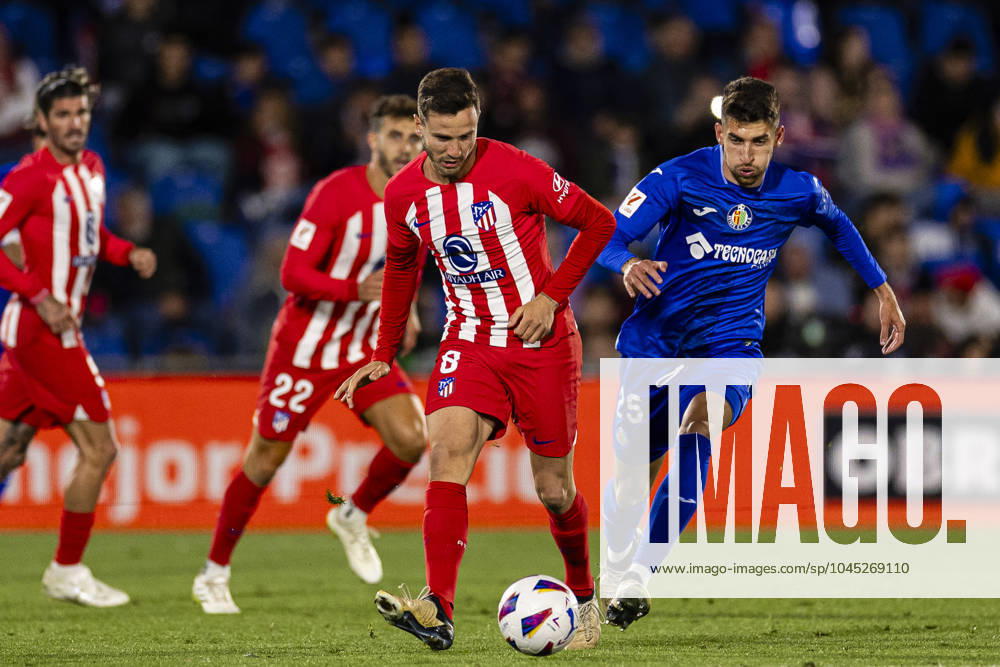 Getafe, Spain May 15 Saul Niguez of Atlà tico de Madrid L is chased by Yellu Santiago of Getafe R during the La Liga football match between Getafe FC v Atlà tico de Madrid at the Coliseum Alfonso Pà rez in Getafe, Spain Photo by Just Pictures Getafe Coliseum Afonso Perez Madrid Spain
