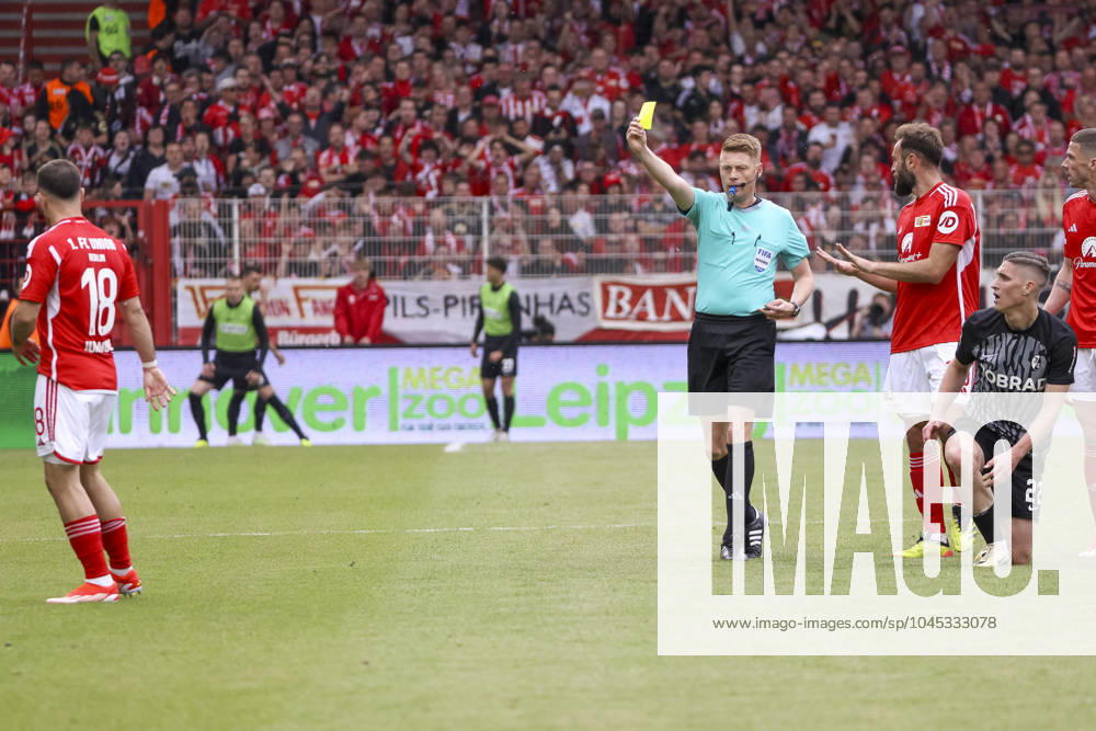Josip Juranovic 1 FC Union Berlin, 18 gets yellow card from referee Christian Dingert , 1 Bundesliga, Matchday 34, 2023 2024, 1 FC Union Berlin vs SC Freiburg, 18 05 2024, Stadion An der Alten Foersterei, Berlin, Germany DFL REGULATIONS PROHIBIT ANY USE OF PHOTOGRAPHS AS IMAGE SEQUENCES AND OR QUASI VIDEO Berlin Stadion An der Alten Foersterei Land Berlin Germany