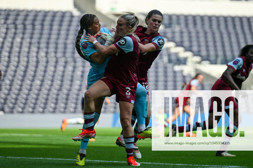 Tottenham Hotspur Women v West Ham United Women FA Women s Super League 18 05 2024. West Ham United Women defender Kirsty Smith (2) & West Ham United Women forward Emma Harries (12) clatter into Tottenham Hotspur Women goalkeeper Rebecca Spencer (22) to stop her taking the quick kick during the FA Women s Super League match between Tottenham Hotspur Women and West Ham United Women at Tottenham Hotspur Stadium, London, United Kingdom on 18 May 2024. Editorial use only DataCo restrictions apply See www.football-dataco.com ,