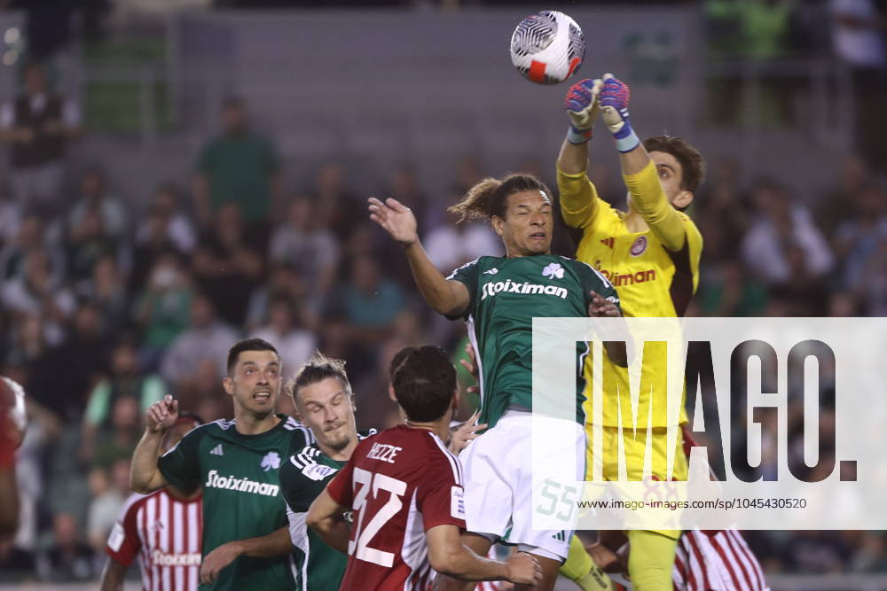 Willian Arao of Panathinaikos FC in action against Konstantinos Tzolakis goalkeeper of Olympiacos FC during the SuperLeague playoffs soccer match between Panathinaikos FC and Olympiacos FC held at Apostolos Nikolaidis Stadium in Athens, Greece, 19 May 2024. IMAGO ONE INCH PRODUCTIONS ATHENS Greece