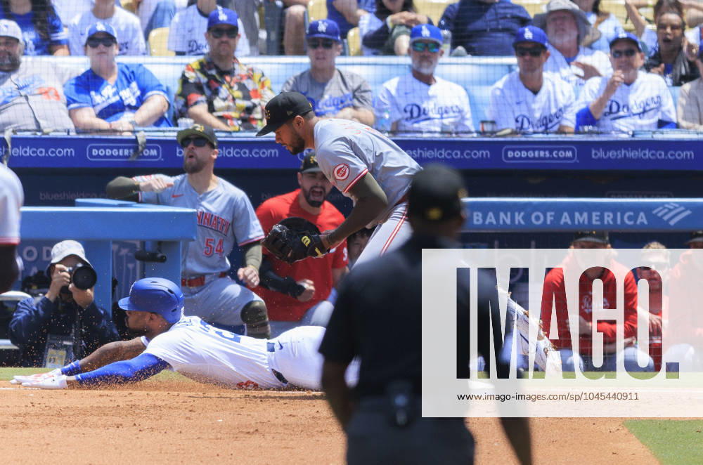 Jason Heyward 23 of the Los Angeles Dodgers slides late at first base for an out during their MLB, Baseball Herren, USA regular season game against the Cincinnati Reds on Sunday May 19, 2024 at Dodger Stadium in Los Angeles, California. JAVIER ROJAS PI Los Angeles USA - ZUMAp124 20240519_zaa_p124_005