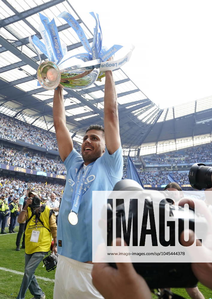 Manchester, England, 19th May 2024. Rodri of Manchester City celebrates with the Premier league trophy during the Premier League match at the Etihad Stadium, Manchester. Picture credit should read: Andrew Yates Sportimage . SPI-3159-0067