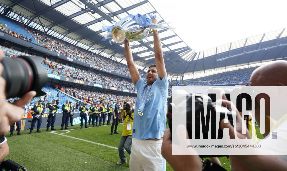 Manchester, England, 19th May 2024. Rodri of Manchester City celebrates with the Premier league trophy during the Premier League match at the Etihad Stadium, Manchester. Picture credit should read: Andrew Yates Sportimage . SPI-3159-0068