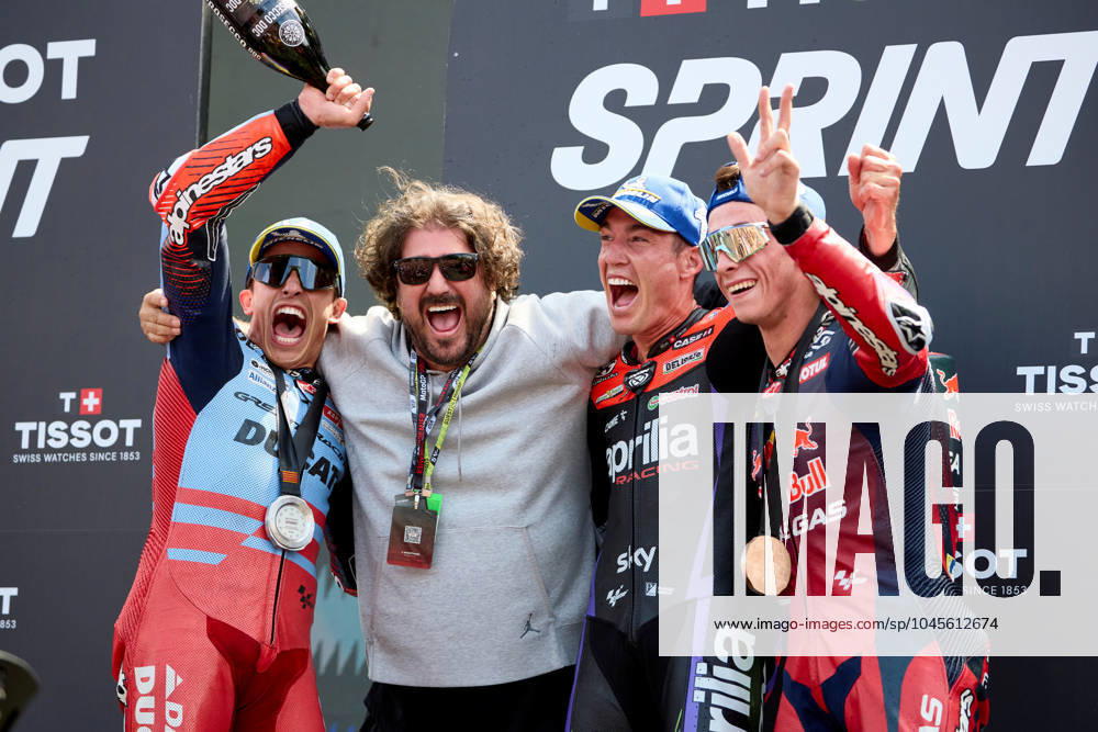 25th May 2024; Circuit de Barcelona, Barcelona, Catalonia, Spain; 2024 MotoGP of Catalunya Qualifying Day; sprint race podium ceremony, (L-R) 2nd place Marc Marquez of the Gresini Racing, spanish singer Antonio Orozco, 1st place Aleix Espargaro of the Aprilia Racing and 3rd place Pedro Acosta of the Red Bull GasGas Tech3 celebrate after the sprint race ActionPlus12647094 PabloxGuillen