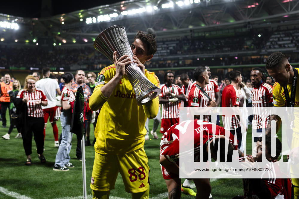 Olympiacos FC v ACF Fiorentina - UEFA Conference League Konstantinos Tzolakis of Olympiacos FC kisses the trophy during the award ceremony following the UEFA Conference League final football match between Olympiacos FC and ACF Fiorentina. Athens Greece
