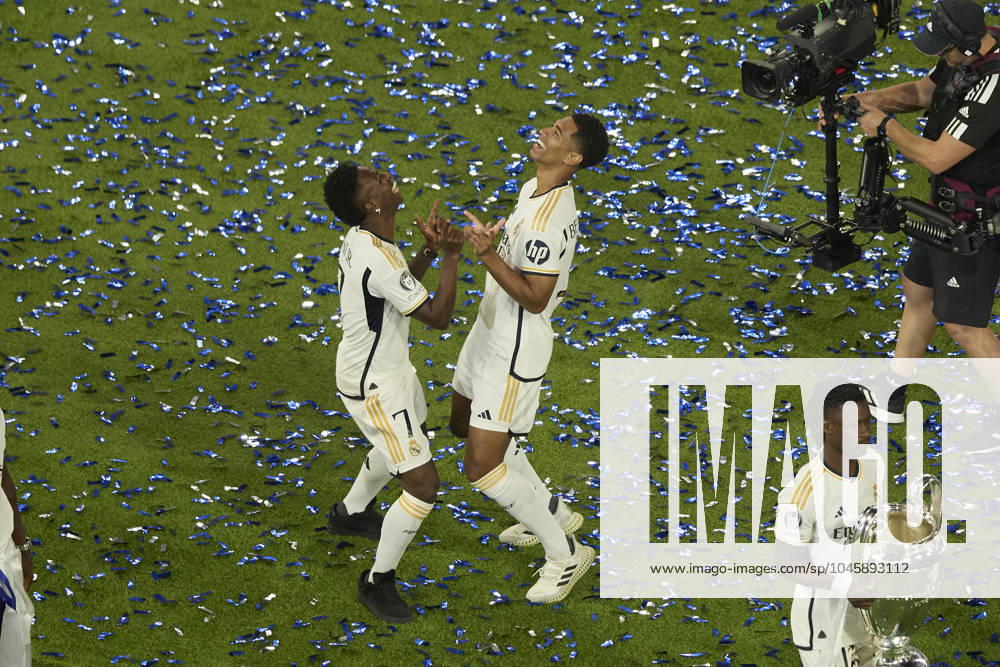 Vinicius Jr (Real Madrid CF) and Jude Bellingham (Real Madrid CF) dancing during the Trophy parade, Real Madrid trophy parade, Real Madrid Trophy parade, Cibeles, June 3, 2024, Madrid, Spain.