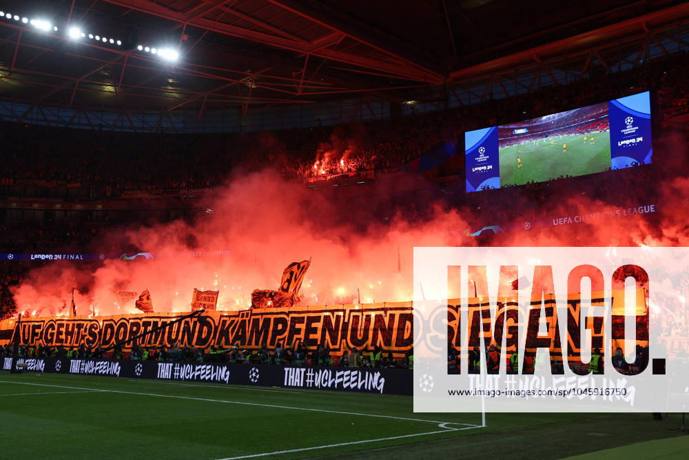 UEFA Champions League Final 2024 Borussia Dortmund Real Madrid on 01 06 2024 at Wembley Stadium in London The Borussia Dortmund fans ignite pyrotechnics in the guest block and present a banner poster with Lets go Dortmund fight and win MH