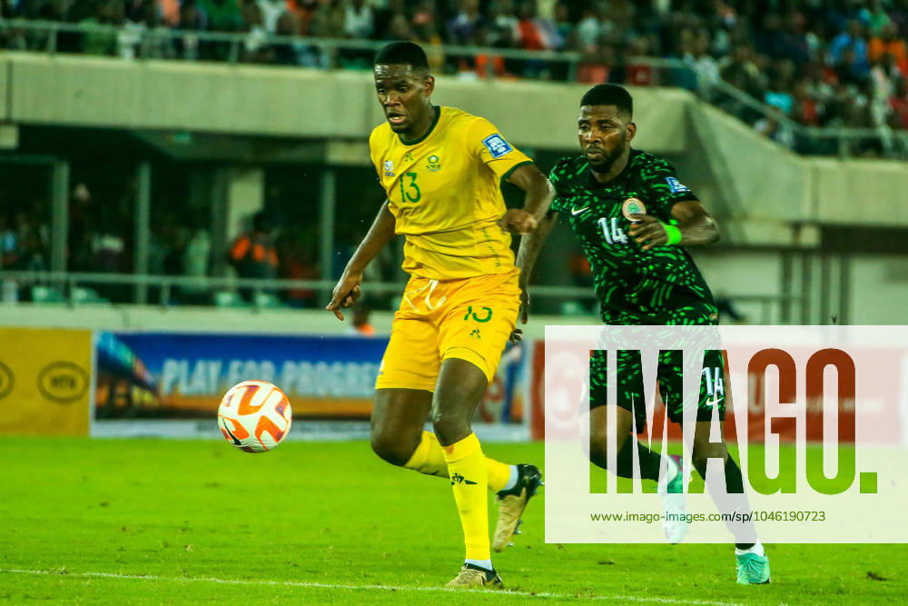 Yaya Sithole of South Africa and Kelechi Iheanacho of Nigeria during the 2026 FIFA World Cup, WM, Weltmeisterschaft, Fussball Qualifier match between Nigeria and South Africa at Goodswill Akpabio International Stadium on June 7, 2024 in Uyo, Nigeria. Photo by Oty Silas