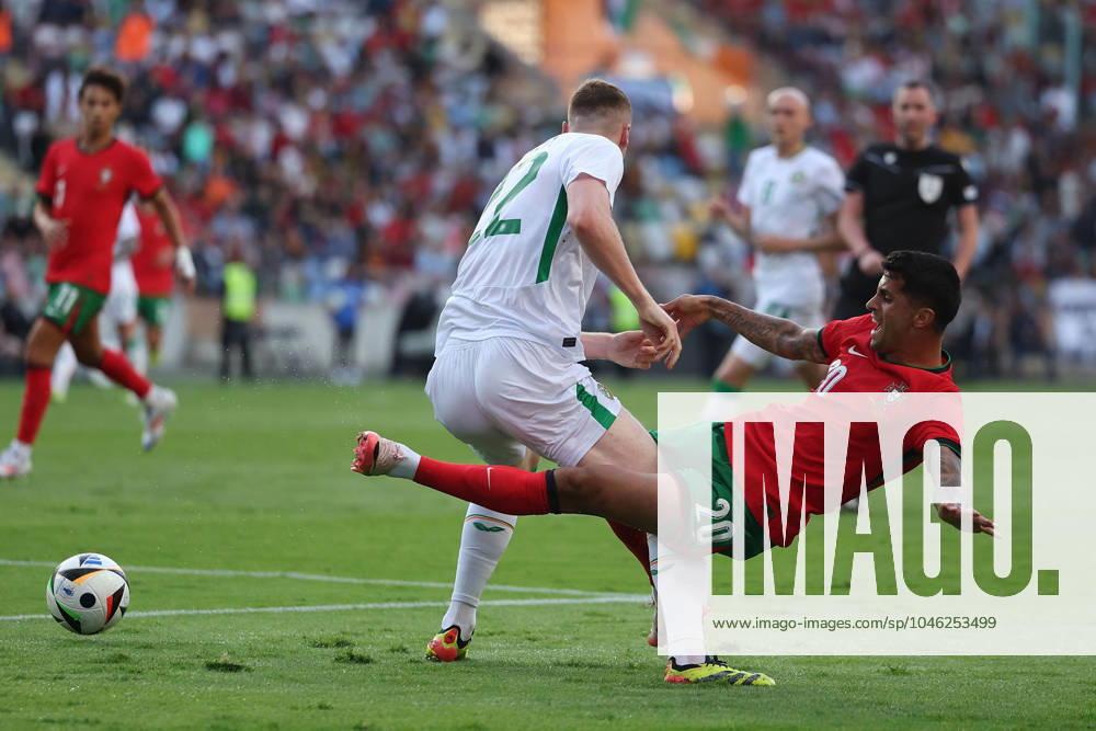 Portugal, Aveiro, 11 06 2024 EURO 2024 Friendly match before the UEFA EURO 2024 in Germany 2024 Portugal Ireland v l , Jake O Brien Ireland , Joao Cancelo Portugal , duel, action, action, battles for the ball