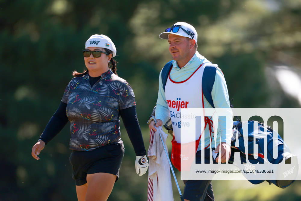 Meijer LPGA, Golf Damen Classic Christina Kim of San Jose, California walks with her caddie to the 5th green during the second round of the Meijer LPGA Classic for Simply Give golf tournament at Blythefield Country Club in Belmont, MI, USA Friday, June 14, 2024. Belmont Michigan United States