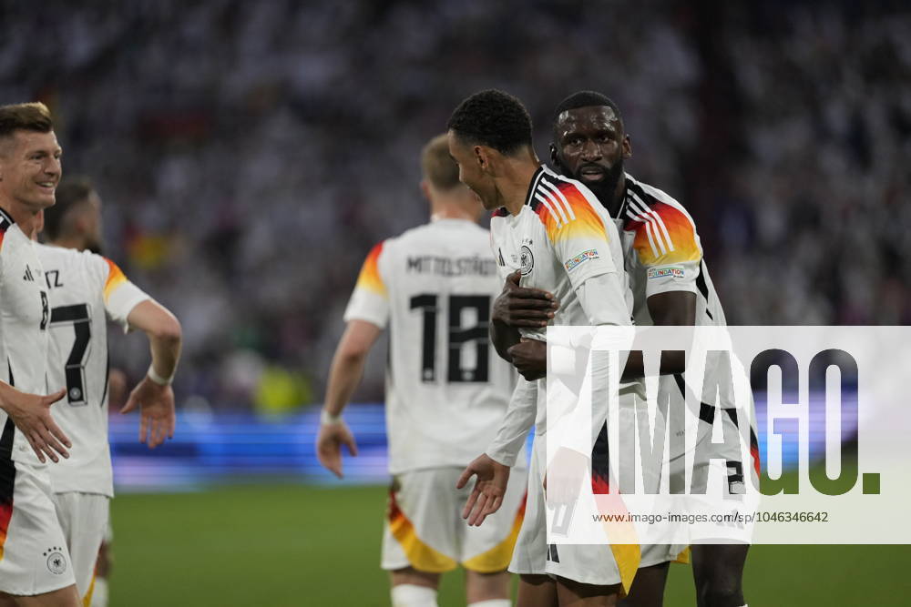 EURO 2024 - Matchday 1: Germany vs. Scotland Jamal Musiala scores and celebrates with Antonio Rudiger and Toni Kroos during the EURO 2024 Day 1 opening match between Germany and Scotland on 14 June 2024, at Munich Football Arena, in Munich, Germany Munich Munich Football Arena Germany